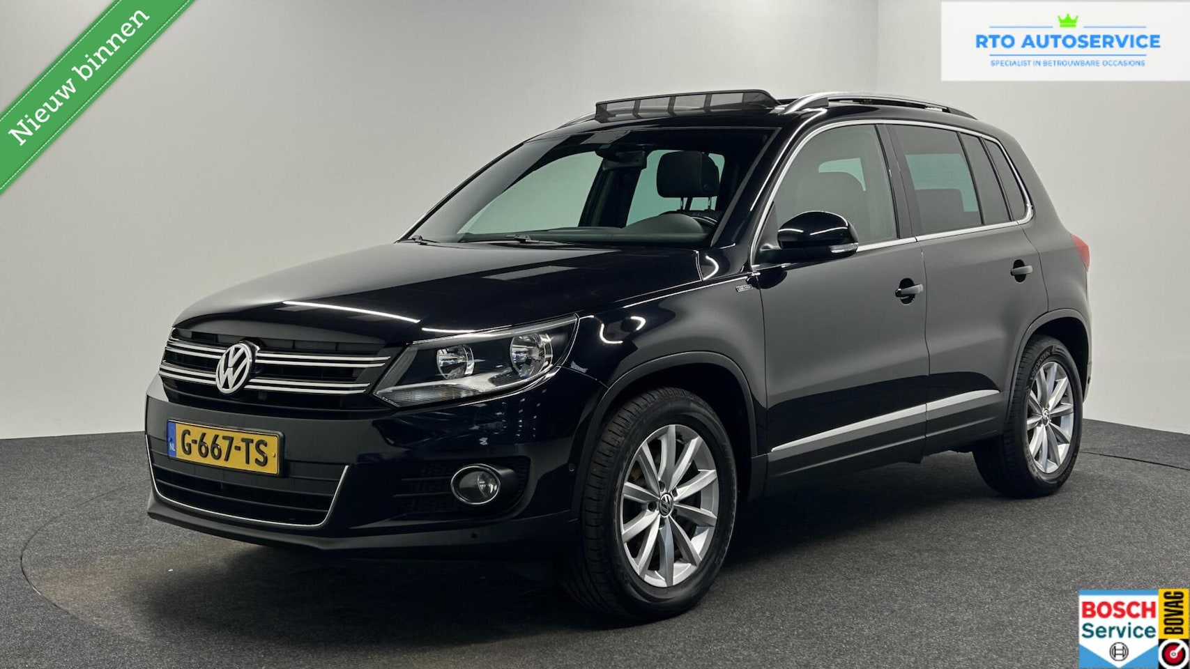 Volkswagen Tiguan - 1.4 TSI Lounge PANO TREKHAAK CRUISE NAVI ECC. - AutoWereld.nl