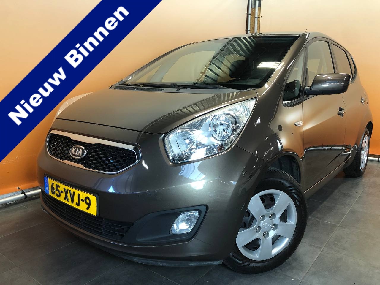 Kia Venga - 1.4 CVVT Plus Pack navi | cruise | airco | metaallak - AutoWereld.nl