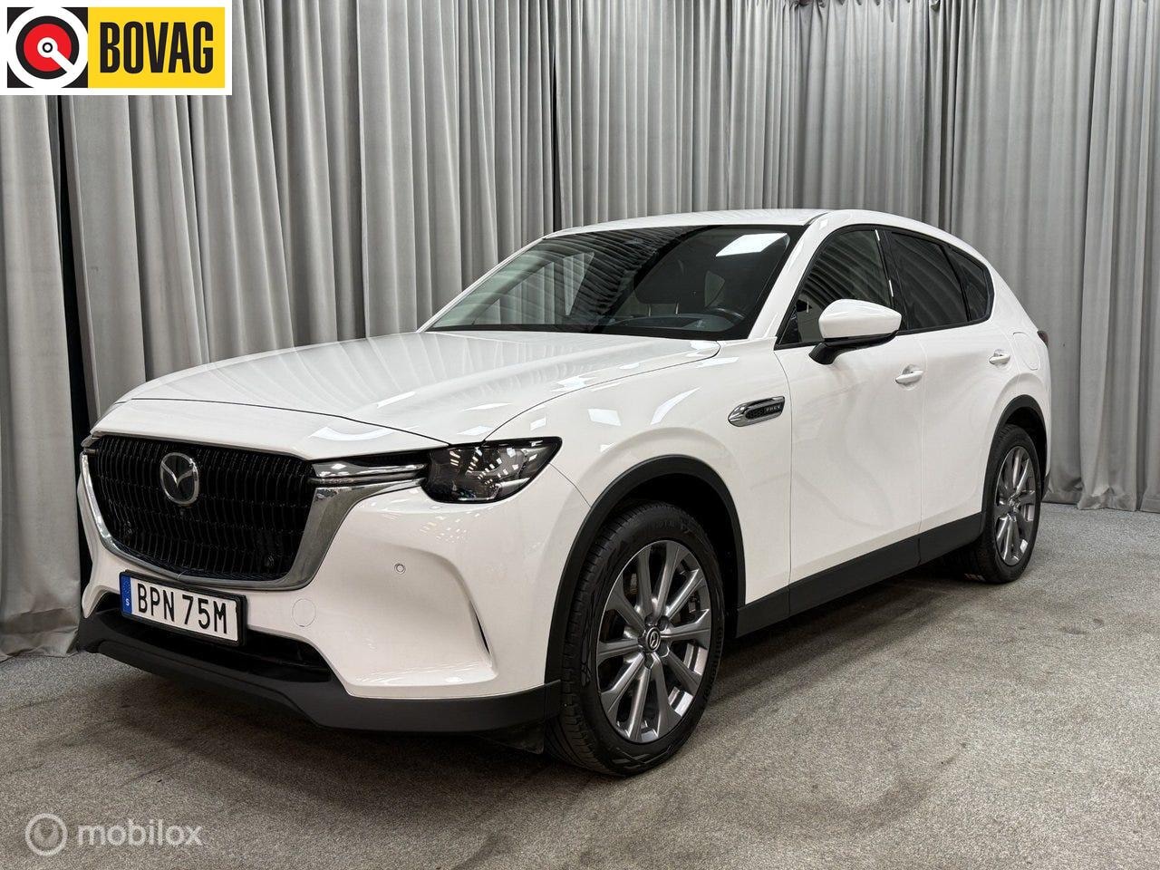 Mazda CX-60 - 2.5 e-SkyActiv PHEV Exclusive, Bose, leer, trek - AutoWereld.nl