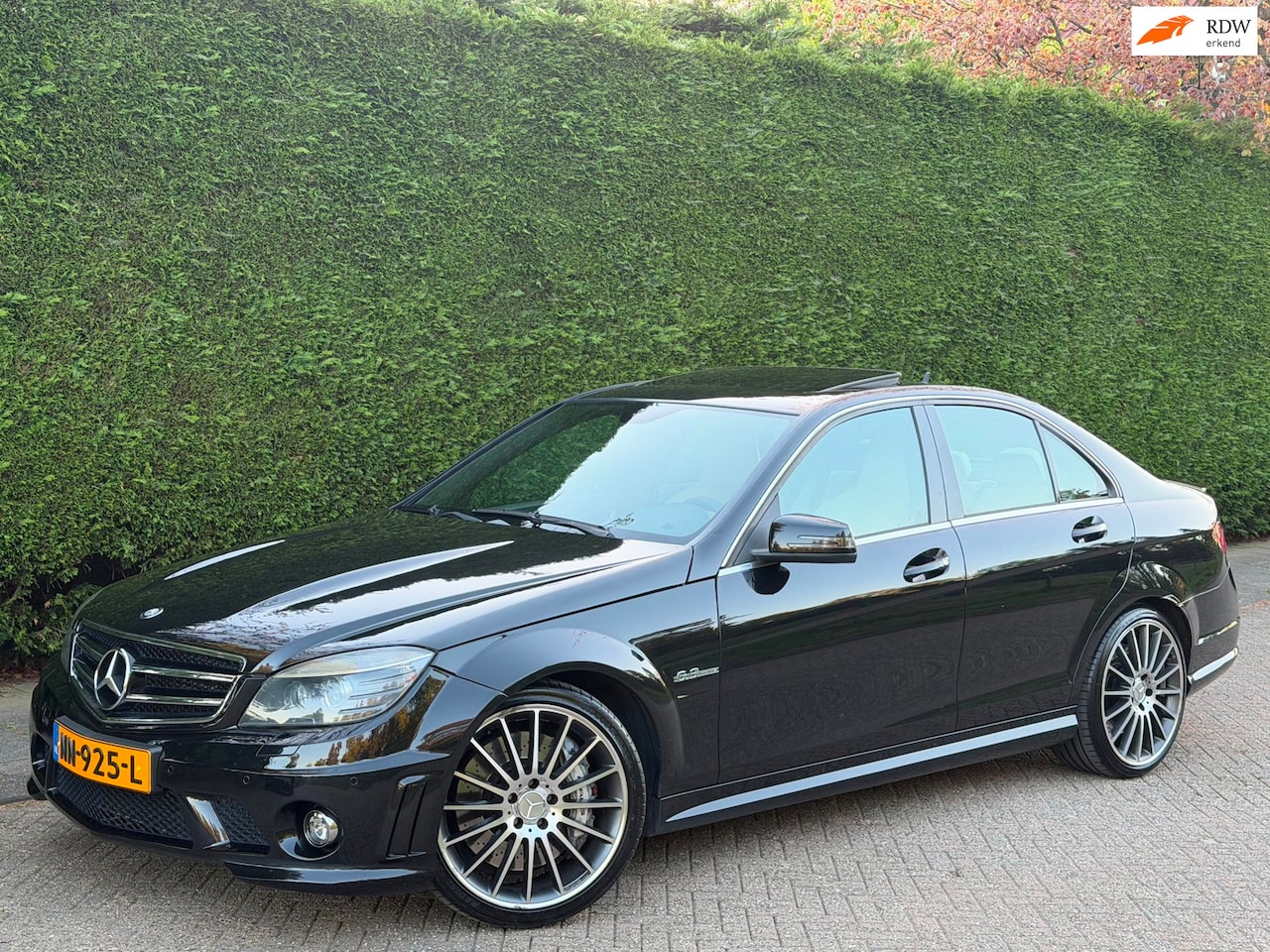 Mercedes-Benz C-klasse - AMG 63 V8 PANO/KUIPST/MEMORY/H&K/LEER - AutoWereld.nl