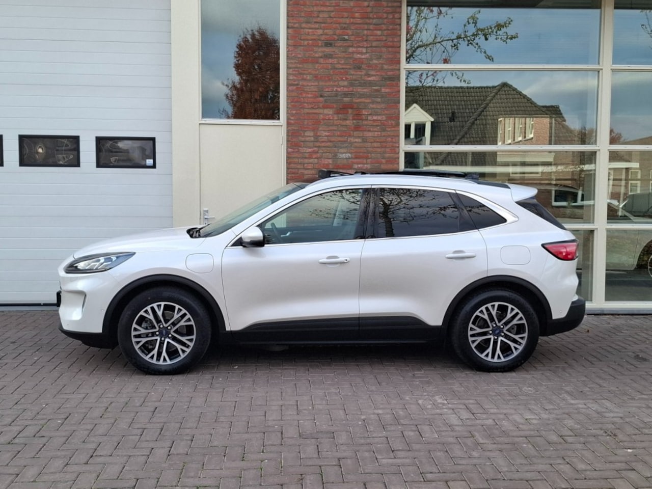 Ford Kuga - 2.5 DURATEC PHEV TITANIUM PANO DAK ELEK TREKHAAK - AutoWereld.nl