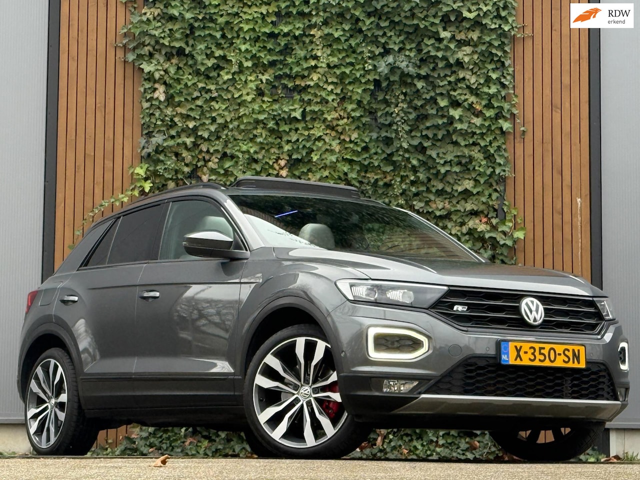 Volkswagen T-Roc - 2.0 TSI 4Motion Sport|R-LINE|LEDER|VIRTUAL|SFEER panoramdak - AutoWereld.nl