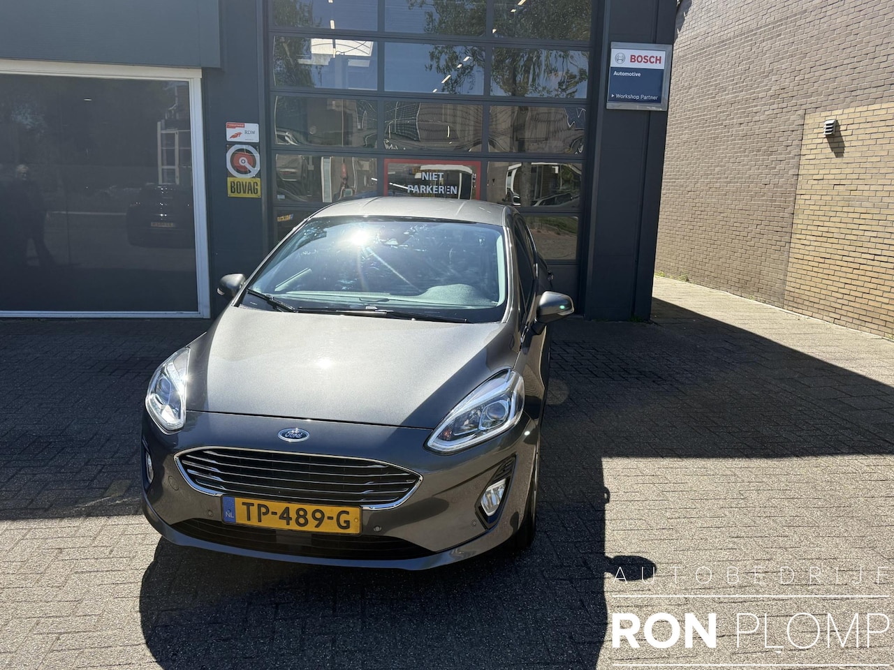 Ford Fiesta - 1.0 EcoBoost Titanium 100PK / Airco clima/ Navigatie/ Camera/ Cruise/ Apple carplay/ PDC/ - AutoWereld.nl
