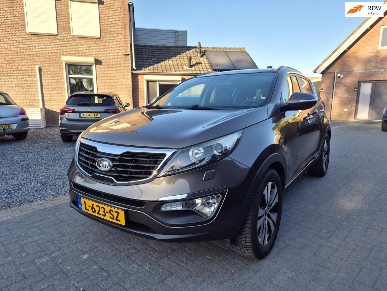 Kia Sportage - 2.0 X-clusive Automaat Navi Clima Cruise Panoramadak - AutoWereld.nl