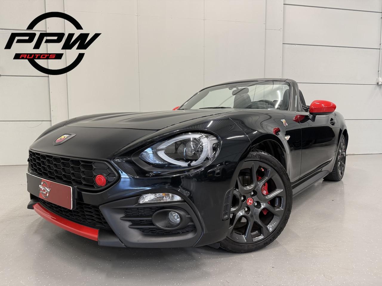 Fiat 124 Spider - Abarth 1.4 MultiAir Turbo aut. LED/BOSE/ZWART-LEER/17"/NAVI/ECC/CRUISE/VOLLEDIGE ABARTH DE - AutoWereld.nl