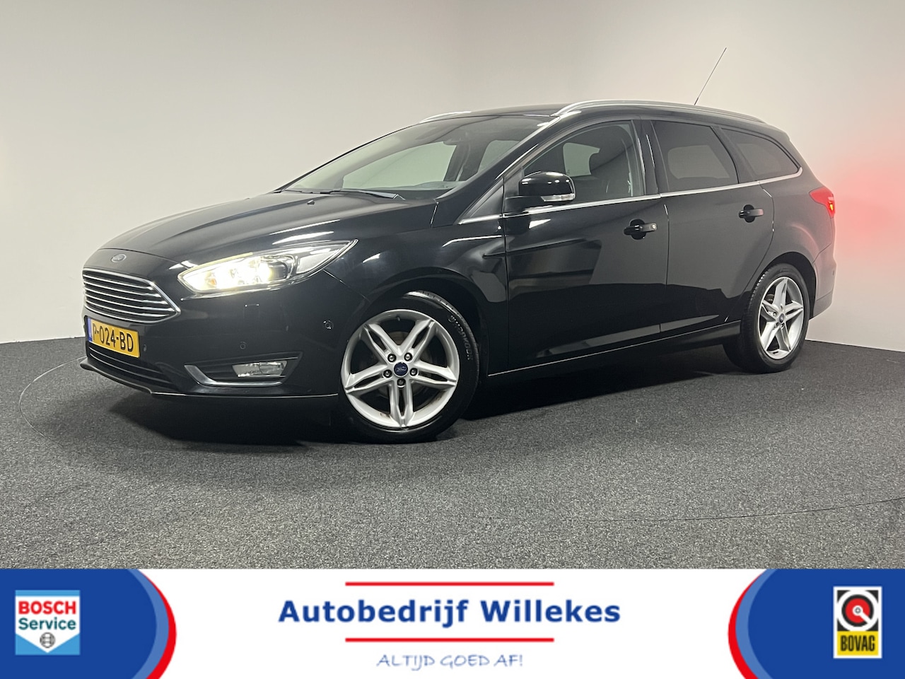 Ford Focus Wagon - 1.0 Titanium | NAVI | KEYLESS | STOELVERWARMING |  CAMERA | - AutoWereld.nl
