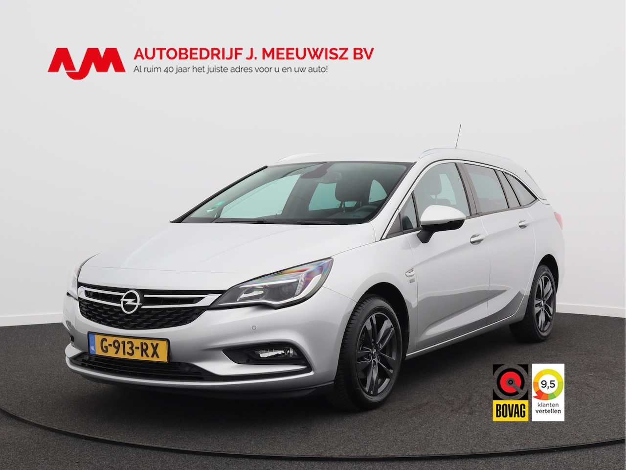 Opel Astra Sports Tourer - 1.0 Turbo 120 Jaar Edition/ lage km/ zeer mooi! - AutoWereld.nl