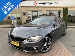 BMW 4-serie Coupé - 428i High Executive | HUD | Camera | Leder
