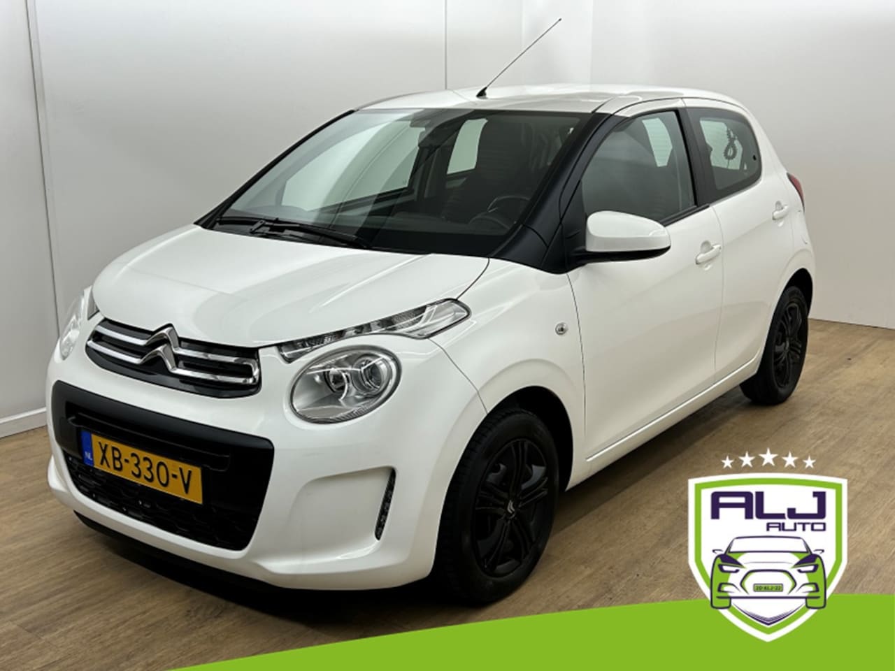 Citroën C1 - Occasion 1.0 VTi Feel | Wit | Tweedehands Citroen C1 | Airco | Bluetooth audio | Cruisecon - AutoWereld.nl