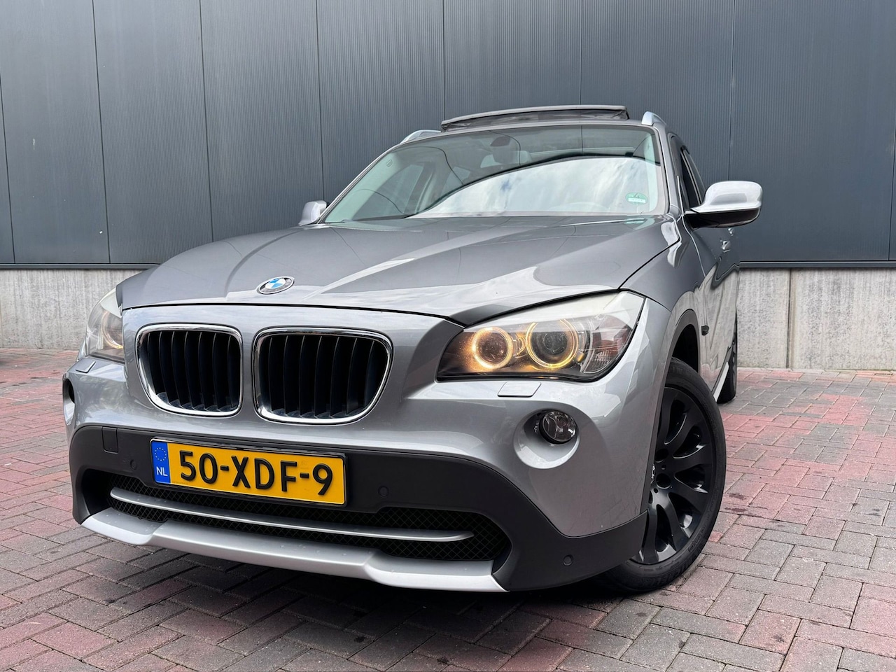 BMW X1 - SDrive20i * Navi * Cruise * Pano * Climate * Leer * Goed Onderhouden * - AutoWereld.nl