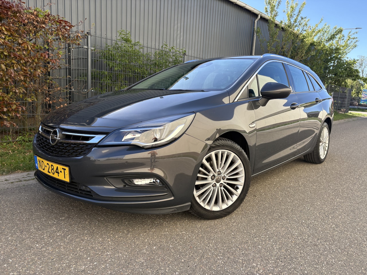 Opel Astra Sports Tourer - 1.4 Innovation / NAVI / KEYLESS / CRUISE / 163dkm! NAP! - AutoWereld.nl