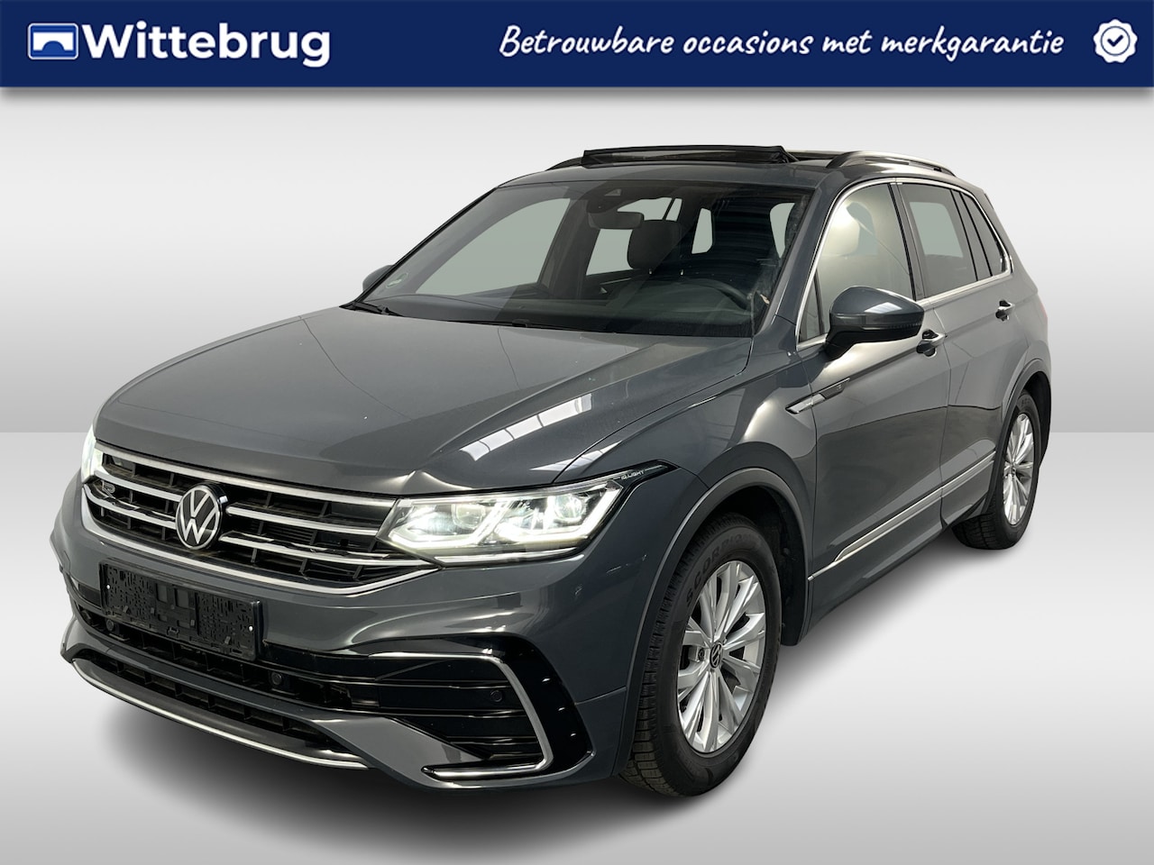 Volkswagen Tiguan - 1.5 TSI R-Line / AUTOMAAT/ PANODAK/ DIGITAL DASH/ CRUISE/ APP-CONNECT/ CLIMATE/ STOELVERWA - AutoWereld.nl