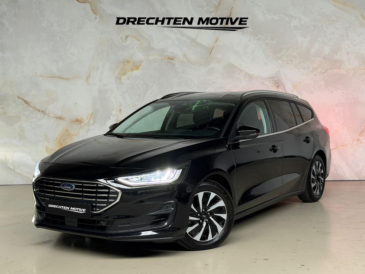 Ford Focus Wagon - 1.0 EcoBoost Hybrid Titanium Automaat / Navi / Cam - AutoWereld.nl