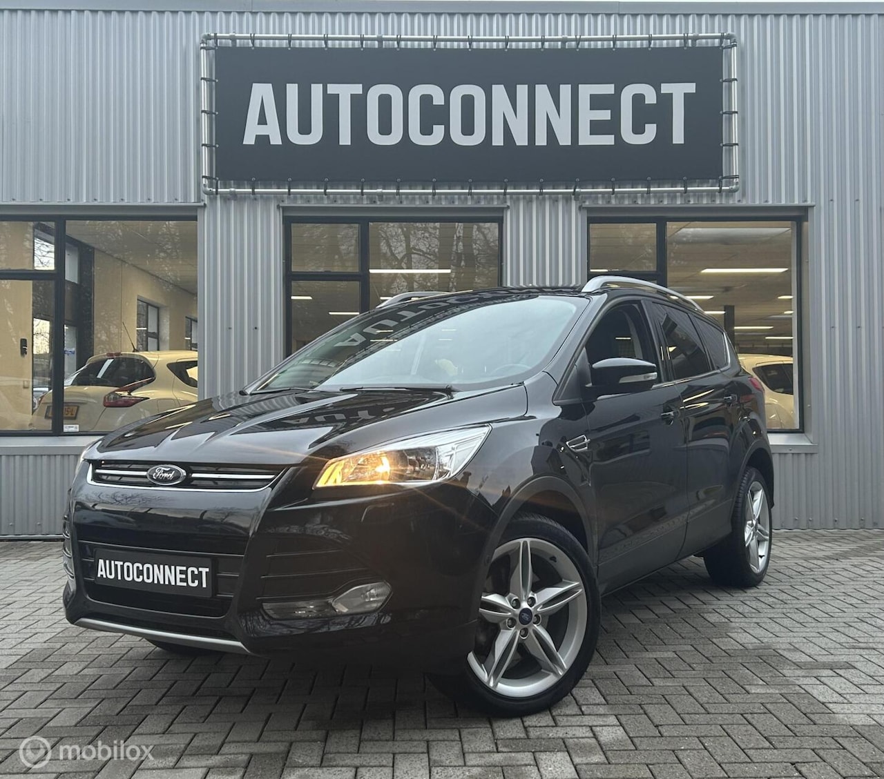 Ford Kuga - 1.5 Titanium 4WD NAVI, LEDER, CRUISE, 1e EIGENAAR - AutoWereld.nl