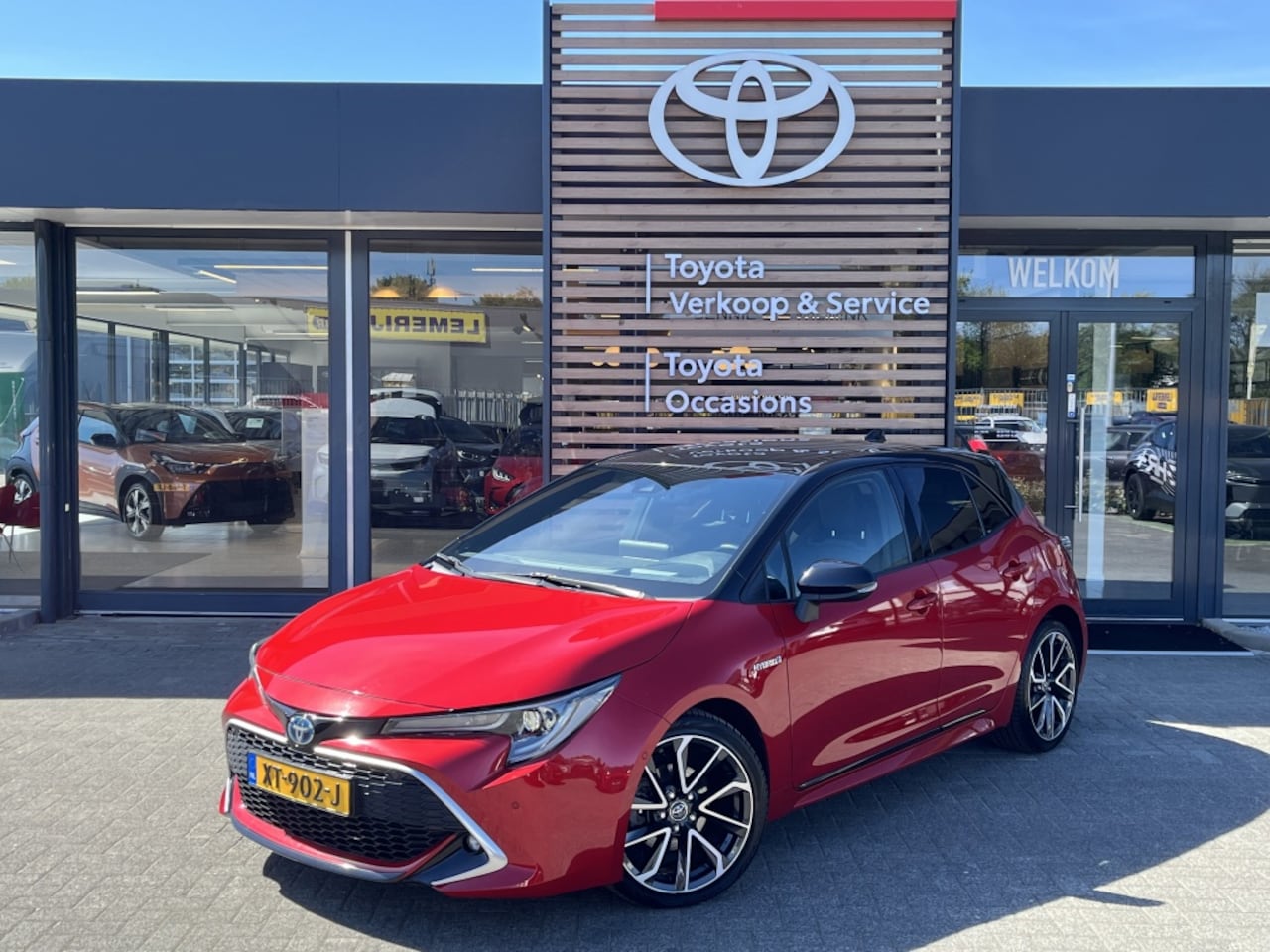 Toyota Corolla - 1.8 Hybrid Executive | Bi-Tone | All Seasons - AutoWereld.nl