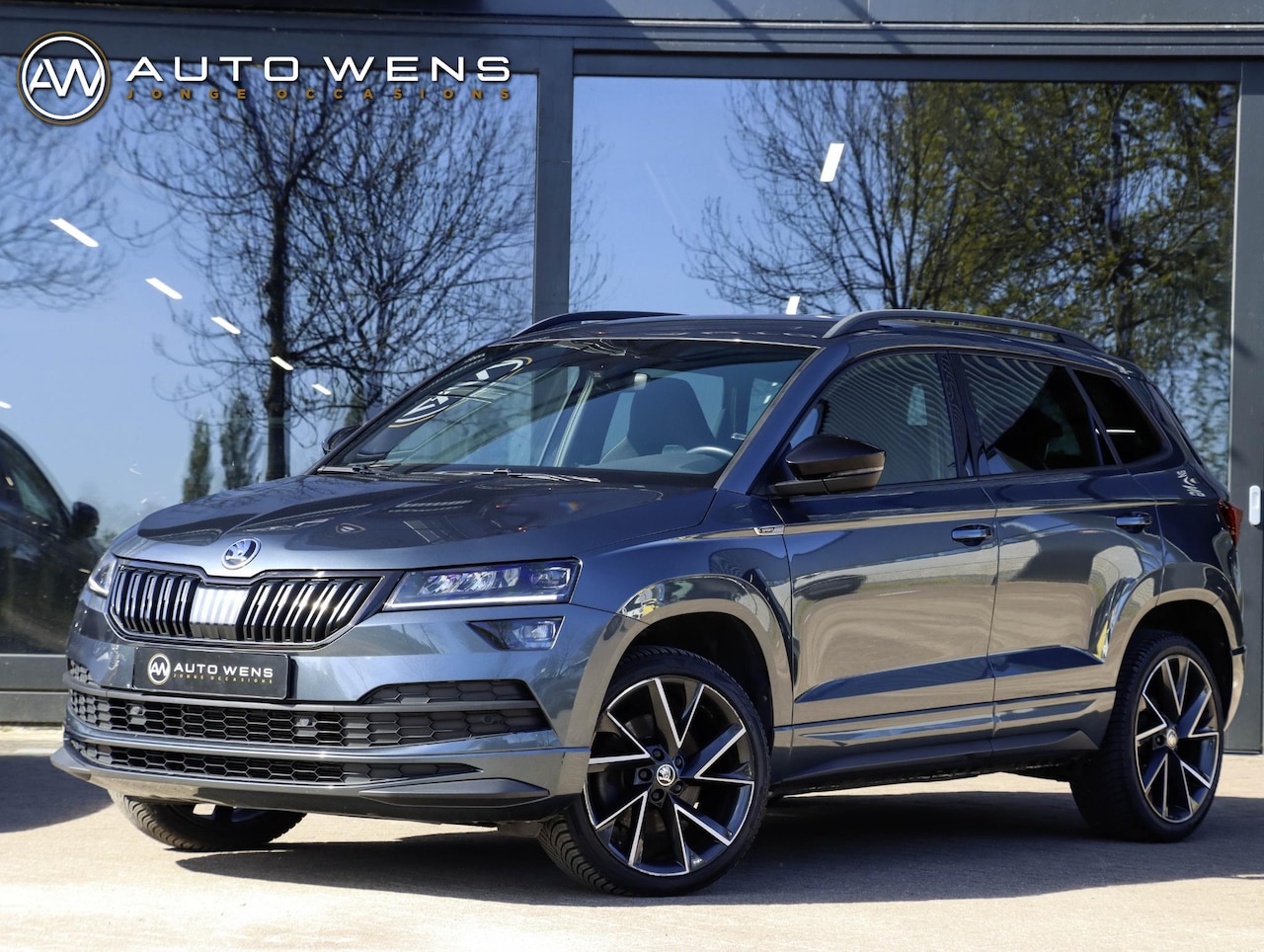 Skoda Karoq - 1.5 TSI ACT Sportline 150pk DSG | Trekhaak - AutoWereld.nl