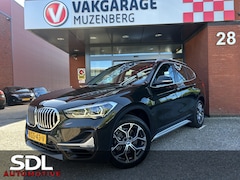 BMW X1 - sDrive18i High Executive Xline // DEALER ONDERHOUDEN // SPORTSTOELEN // FULL LED // HALF L