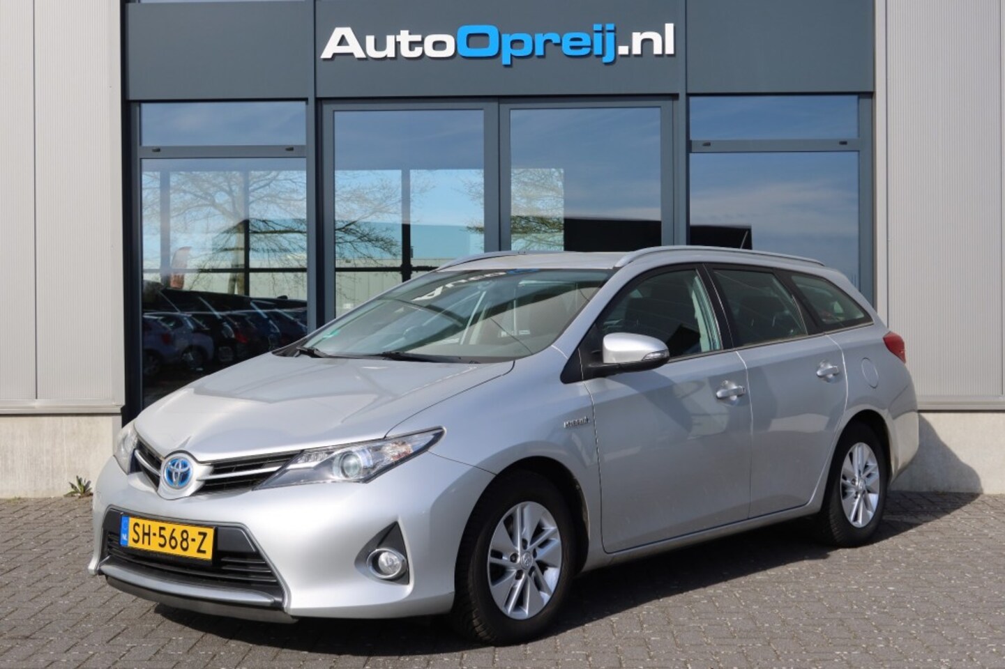 Toyota Auris Touring Sports - 1.8 Hybrid Touring Sports Aspiration Automaat Clima, NAVI, Camera, Cruise, PDC, Dealer ond - AutoWereld.nl