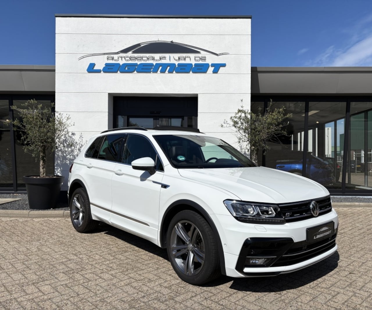 Volkswagen Tiguan - 1.4 TSI Highl. R-line Led | Pano | Camera | Adap. Cruise | - AutoWereld.nl