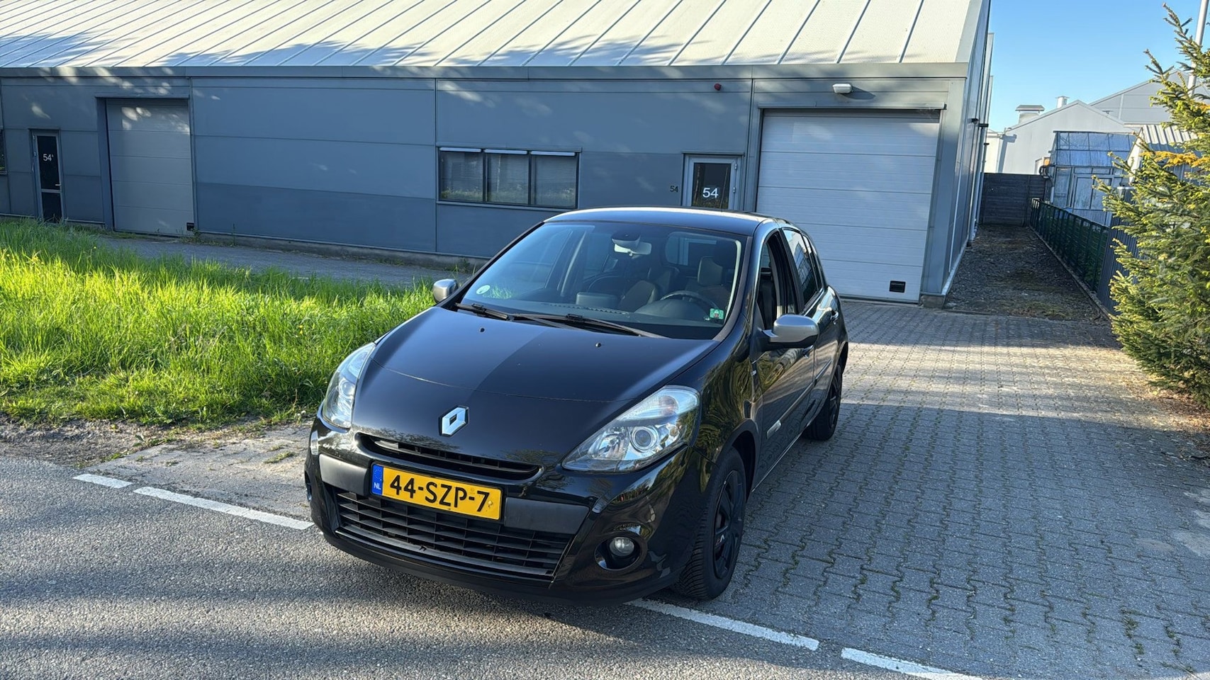 Renault Clio - 1.5 dCi Night & Day CLIMA NAVIGATIE LEER 262.000 NAP ZWART 2012 - AutoWereld.nl