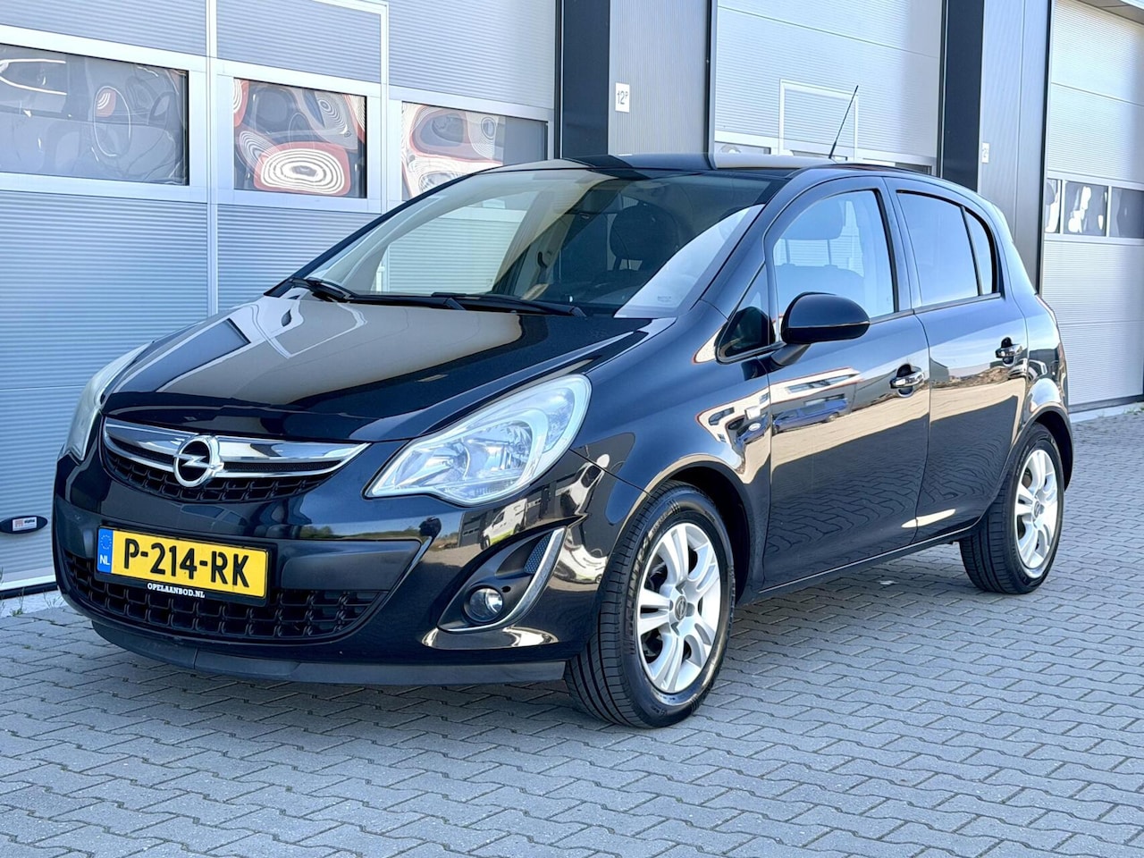 Opel Corsa - 1.4-16V - Airco - 4 Deurs - PDC - Facelift model - AutoWereld.nl