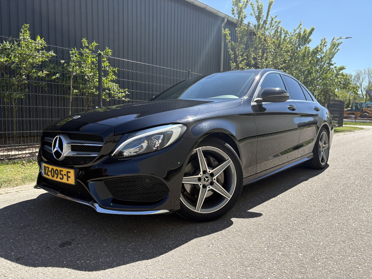 Mercedes-Benz C-klasse - 180 Business Solution AMG / AUTOMAAT / NAVI / LEER / CRUISE / 110dkm! NAP! - AutoWereld.nl