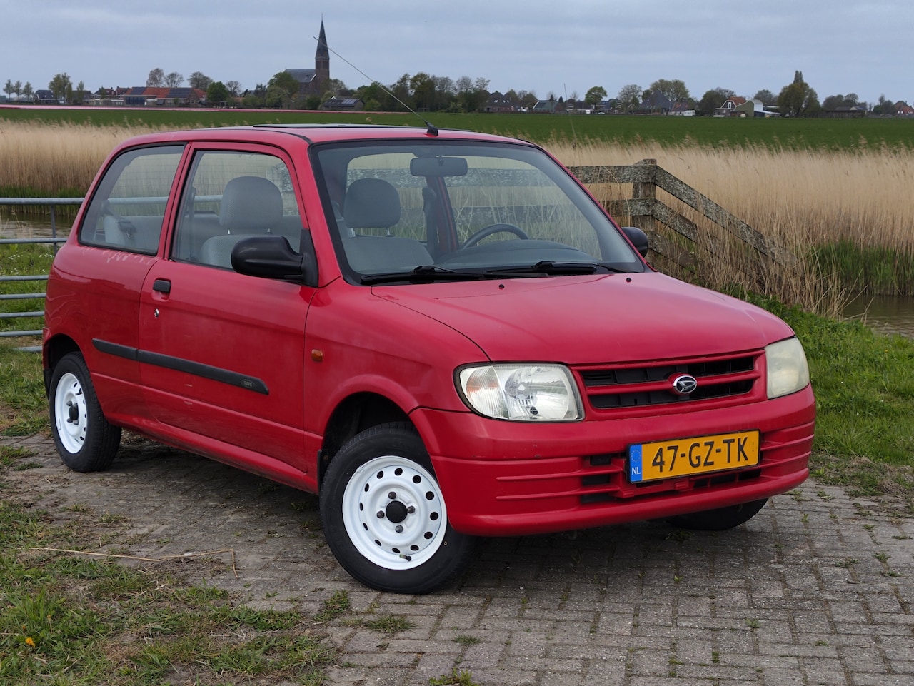 Daihatsu Cuore - 1.0-12V STi Open dak - Lage KM'stand - AutoWereld.nl