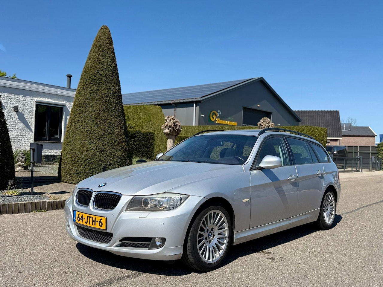 BMW 3-serie Touring - 320i Executive AUT 2009 Pano/Navi/Clima/Lmv - AutoWereld.nl