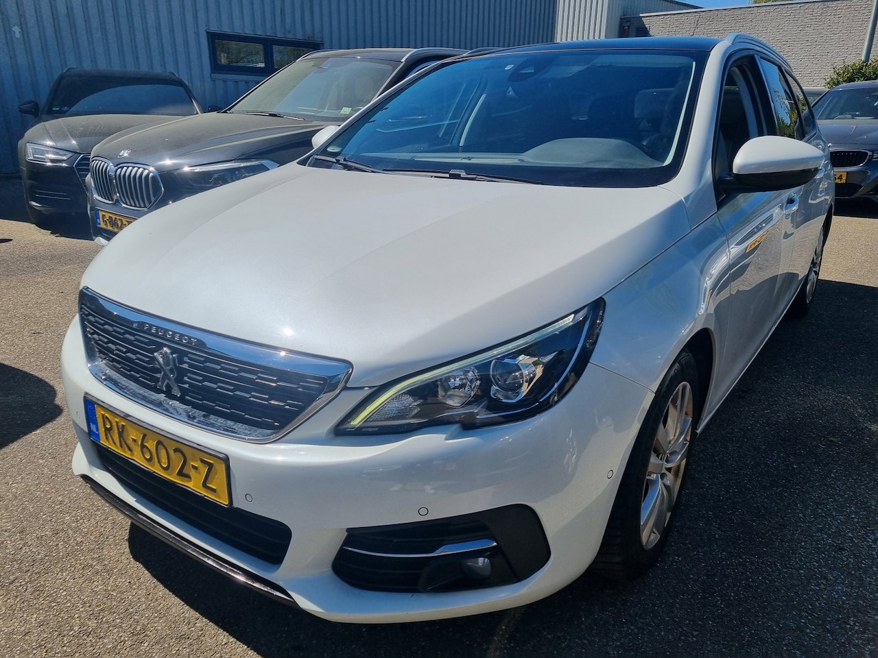 Peugeot 308 SW - 1.2 PureTech Panodak Navi Leder - AutoWereld.nl