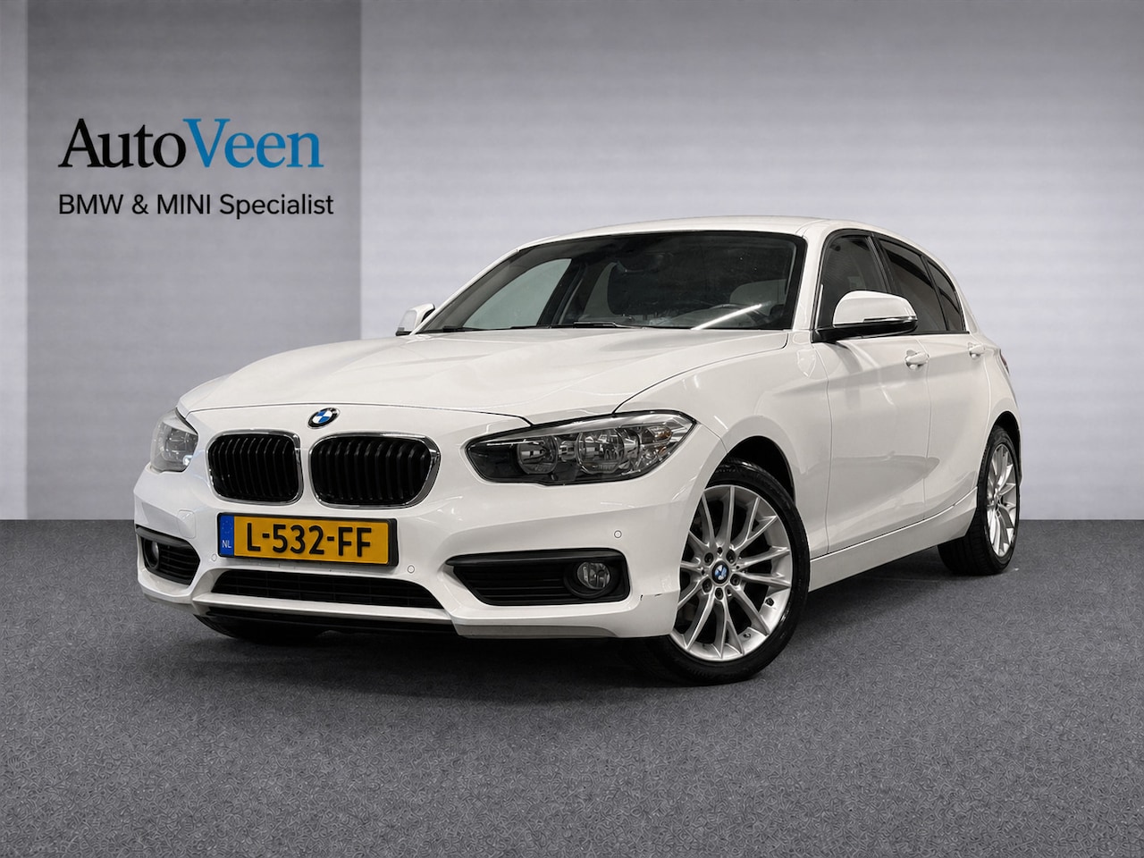 BMW 1-serie - 118i Corporate Lease Executive (CRUISE, NAVI, STOELVERWARMIING, PARKEERSENSOREN, GOED ONDE - AutoWereld.nl