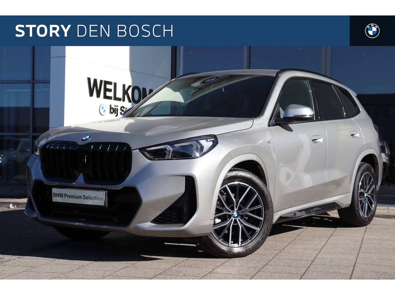 BMW X1 - sDrive18i M Sport Automaat / M Adaptief onderstel / Sportstoelen / Comfort Access / Achter - AutoWereld.nl