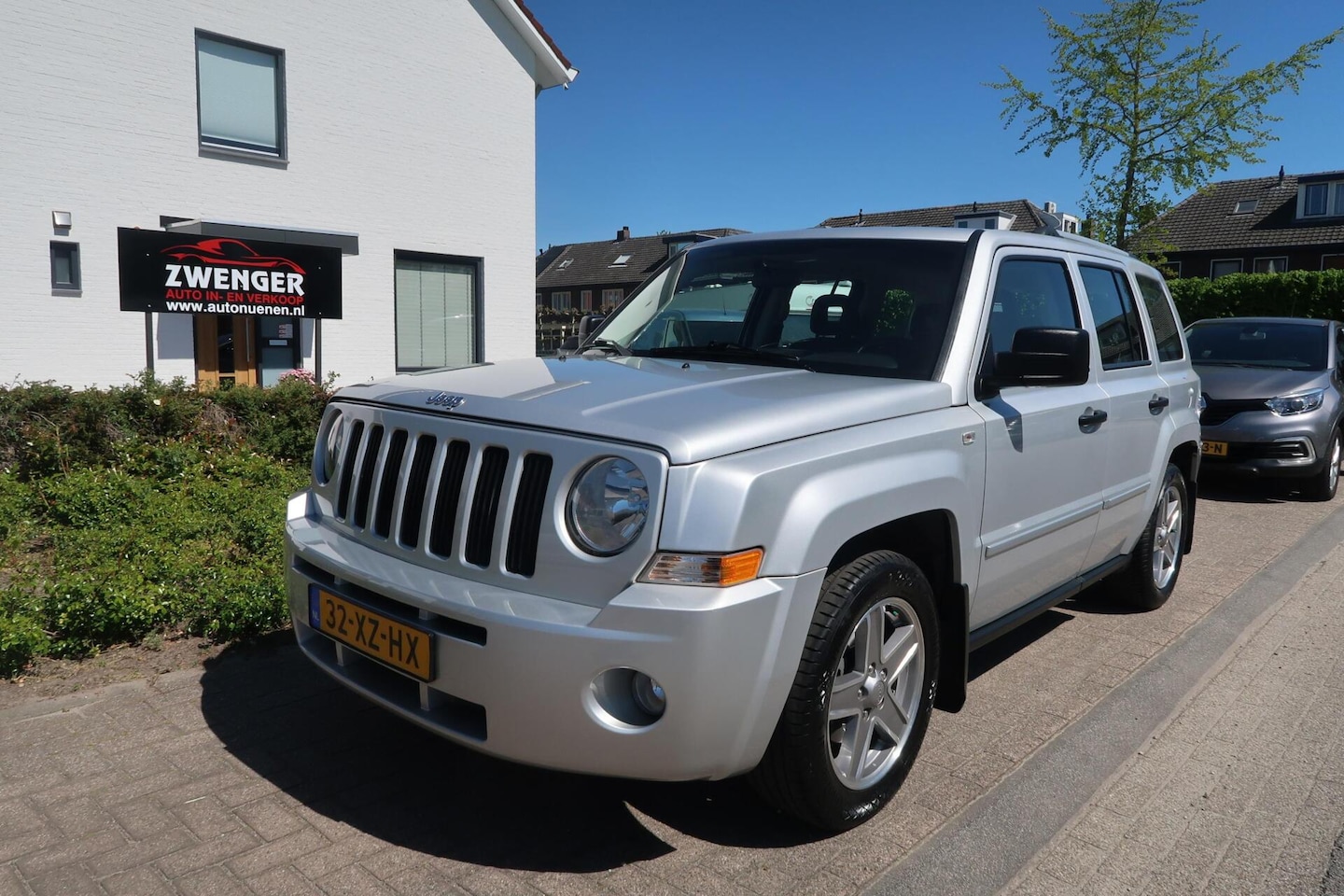 Jeep Patriot - 2.4 Limited AUT TREKHAAK|LEDER|1E EIGENAAR|PDC|AIRCO|PERFECT ONDERHOUDEN - AutoWereld.nl
