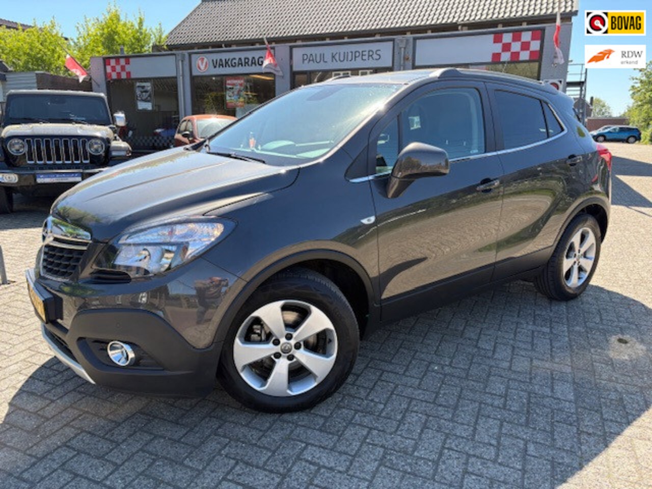 Opel Mokka - 1.4 T 140 Innovation *leder / schuifdak / trekhaak / navi / camera* - AutoWereld.nl