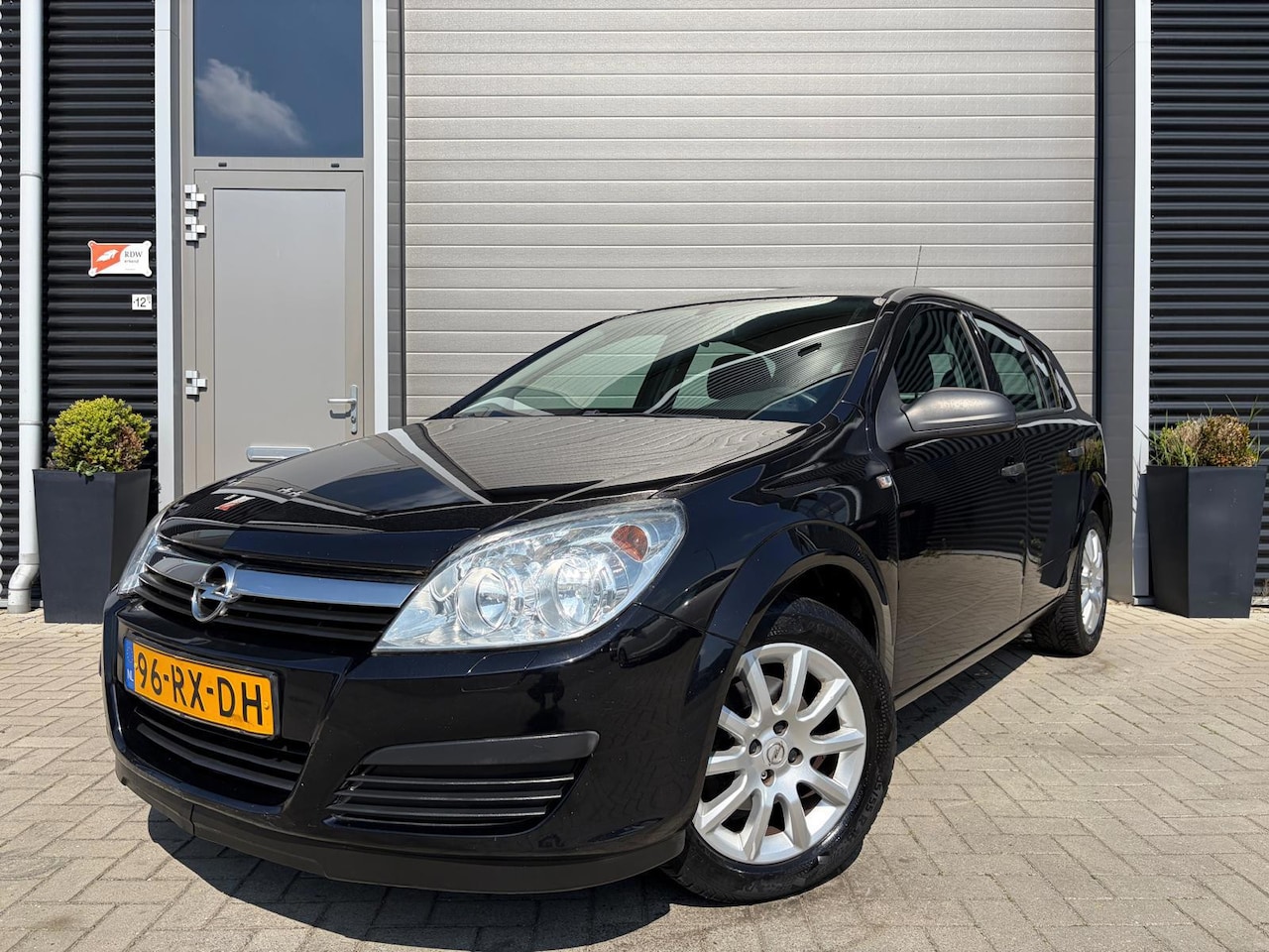Opel Astra - 1.4 Essentia/1e Eigenaar/Airco/Lichtmetaal/Zwart Metallic/ - AutoWereld.nl
