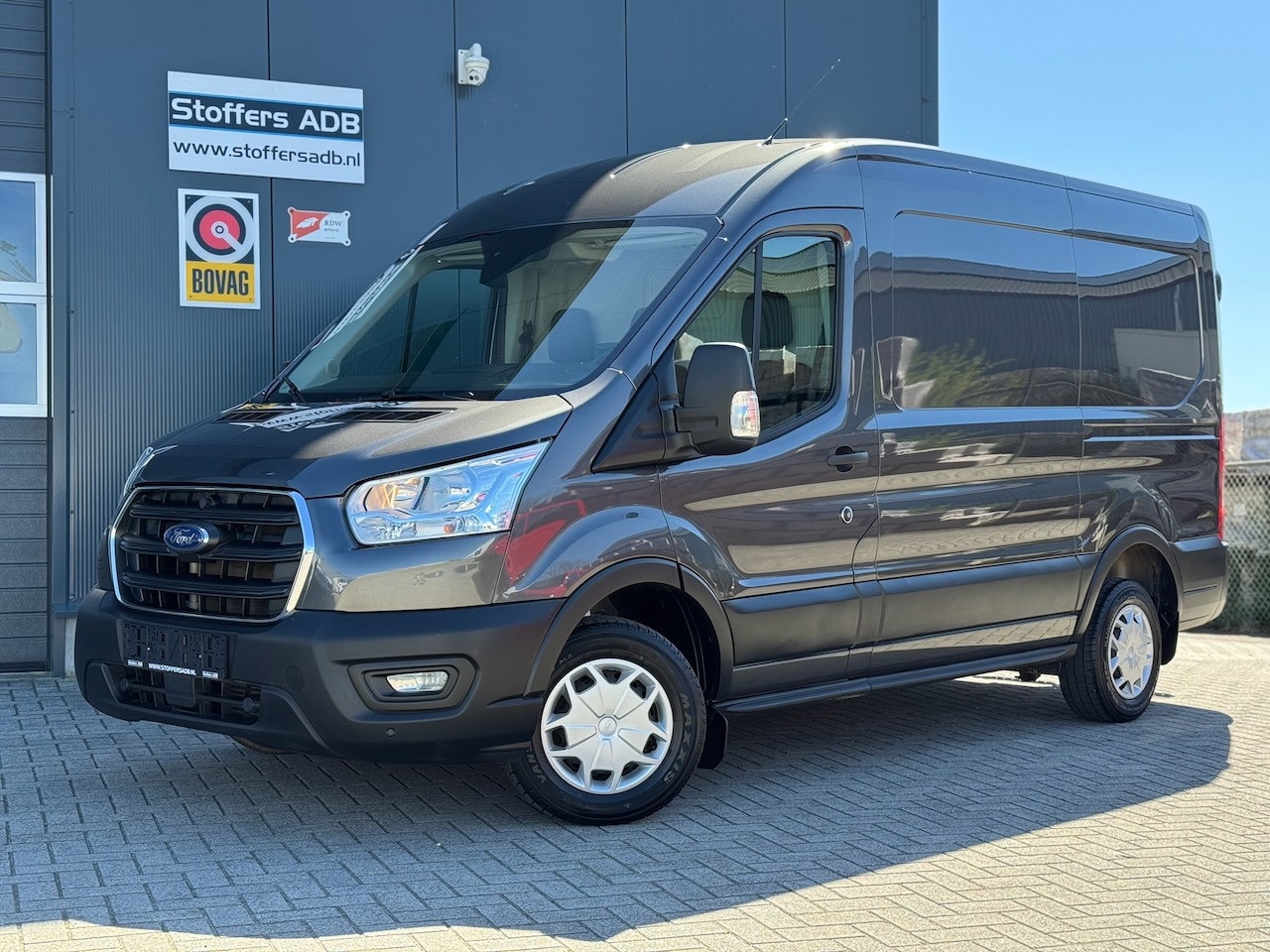 Ford Transit - 310 2.0 TDCI L2H2 Trend | Trekhaak | Metallic | Cruise | Bluetooth | Airco | Laadvloer | P - AutoWereld.nl