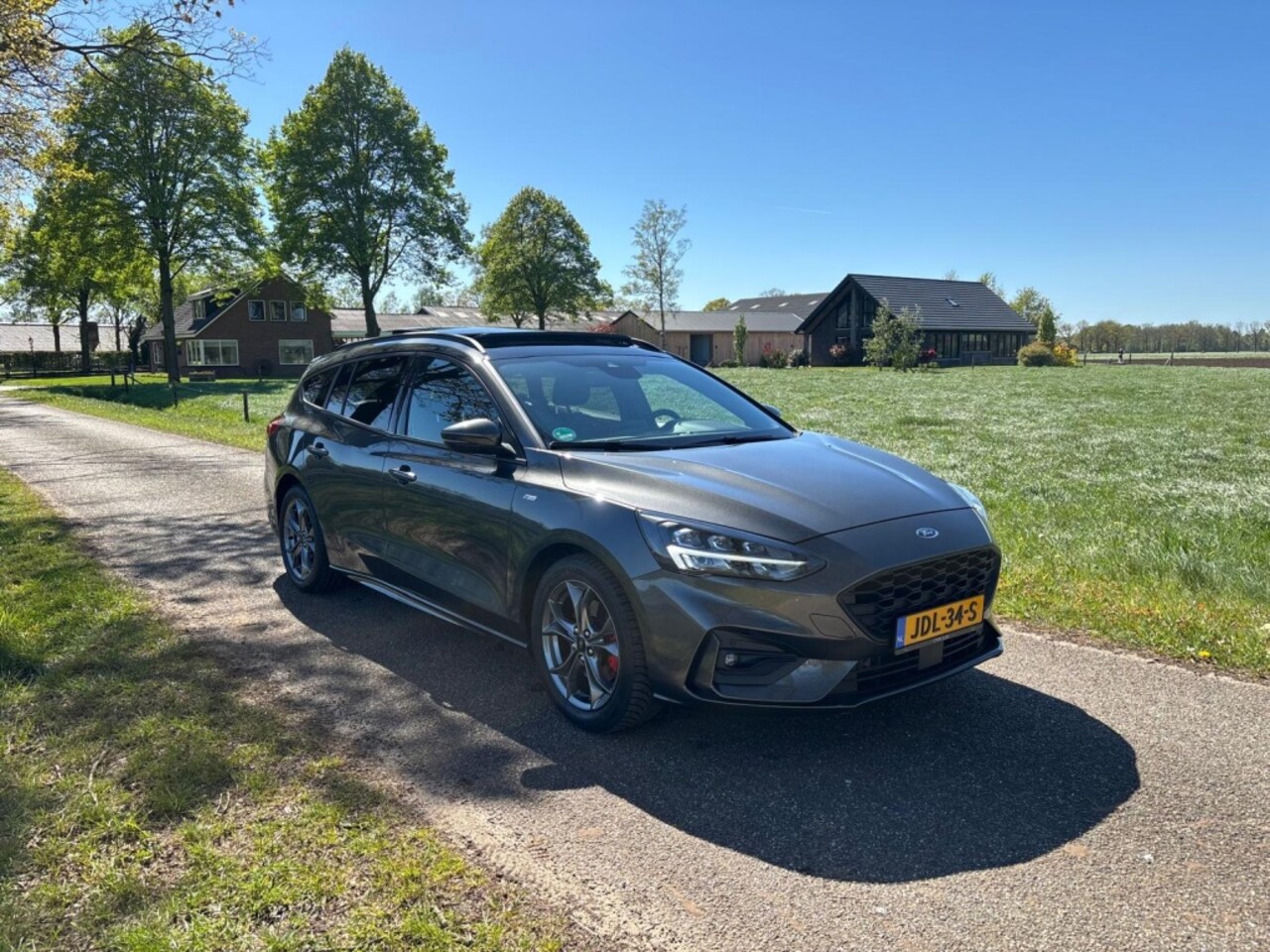 Ford Focus Wagon - 1.5 EcoB. ST Line | Panoramadak | B&O Audio | Adaptieve Cruise | - AutoWereld.nl