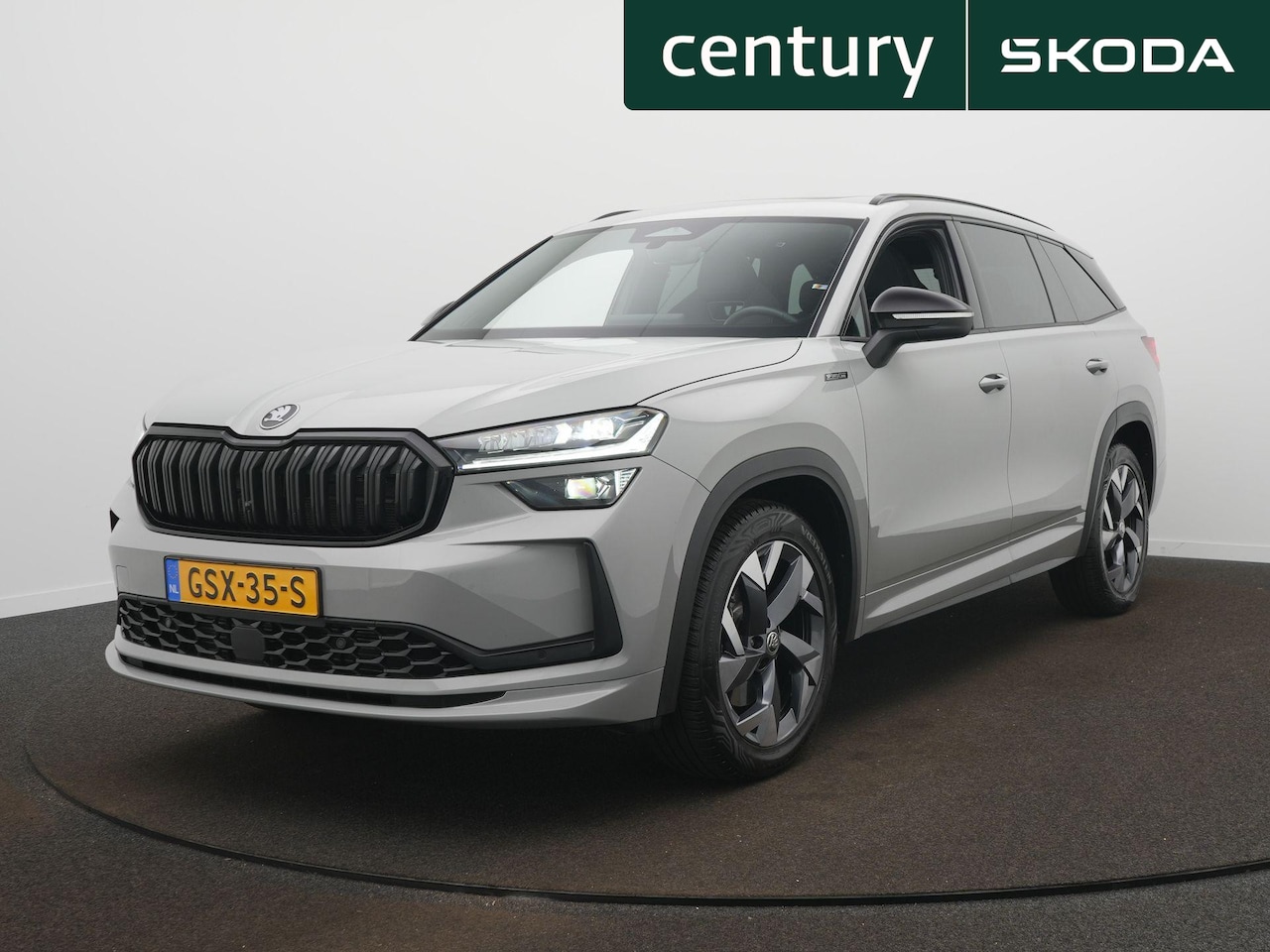 Skoda Kodiaq - 1.5 TSI MHEV Sportline Business 7p / Elek. Trekhaak / Panodak / Camera - AutoWereld.nl