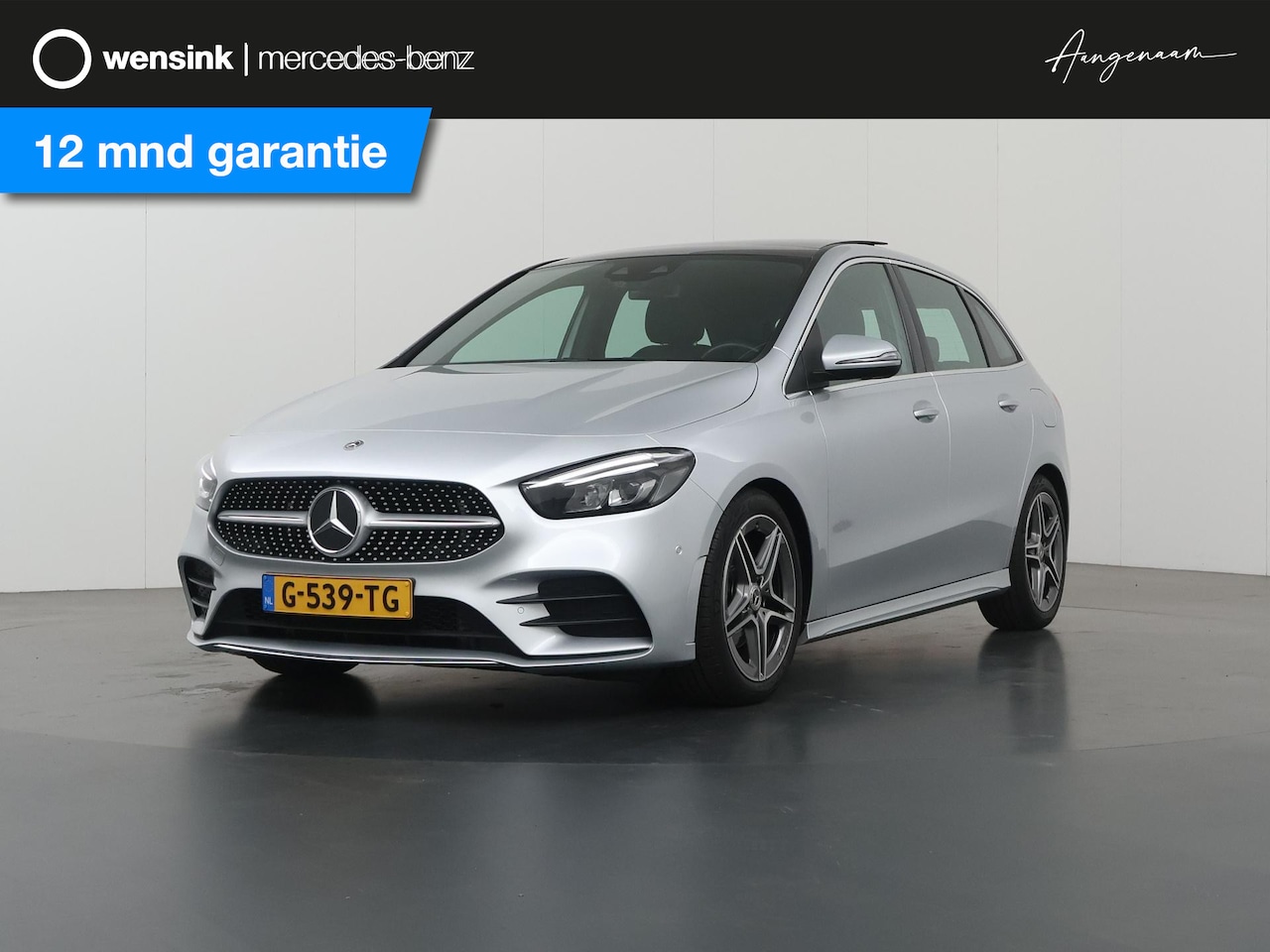 Mercedes-Benz B-klasse - 180 Business Solution AMG | Panoramadak | Trekhaak | Stoelverwarming | Widescreen | - AutoWereld.nl