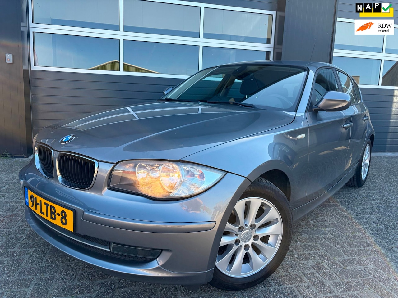 BMW 1-serie - 116i Business Line|Airco|Navi|Nette auto| - AutoWereld.nl