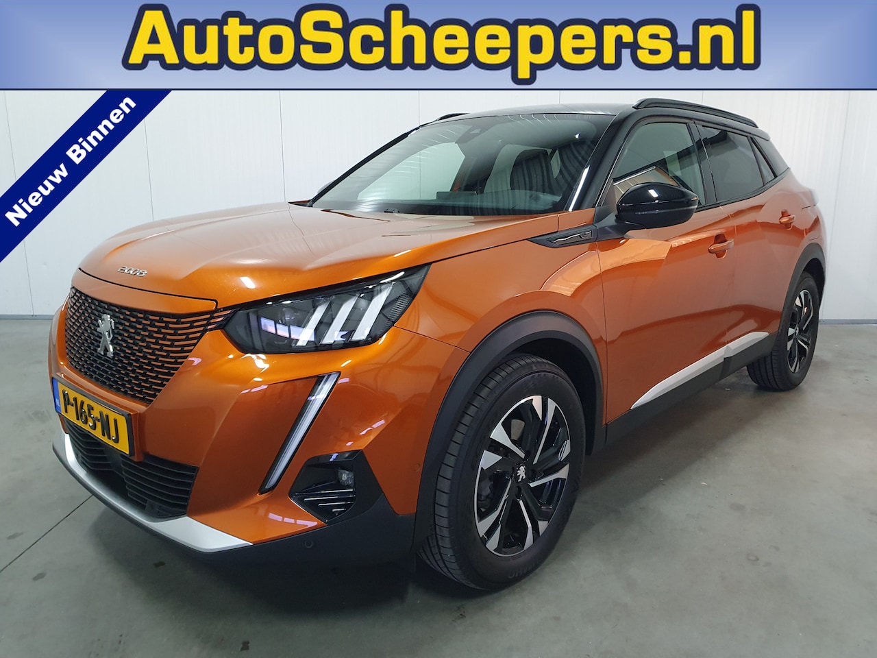 Peugeot e-2008 - EV Allure 50 kWh CARPLAY/PDC/LED/CRUISE/HLEDER - AutoWereld.nl