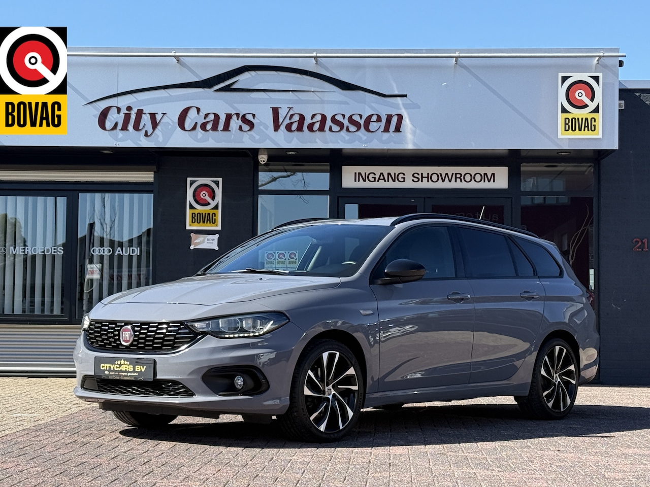 Fiat Tipo - 1.4 s-design 96 pk navi camera climate ctr cruise ctr half leder afn trekhaak lmv 18 inch - AutoWereld.nl