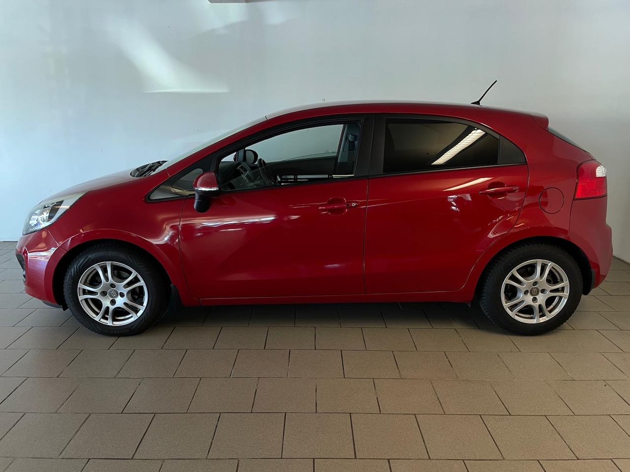 Kia Rio - 1.2 CVVT Super Pack AIRCO CRUISE NAVI PDC TREKHAAK ZEER GOED ONDERHOUDEN NWE APK INRUIL MO - AutoWereld.nl