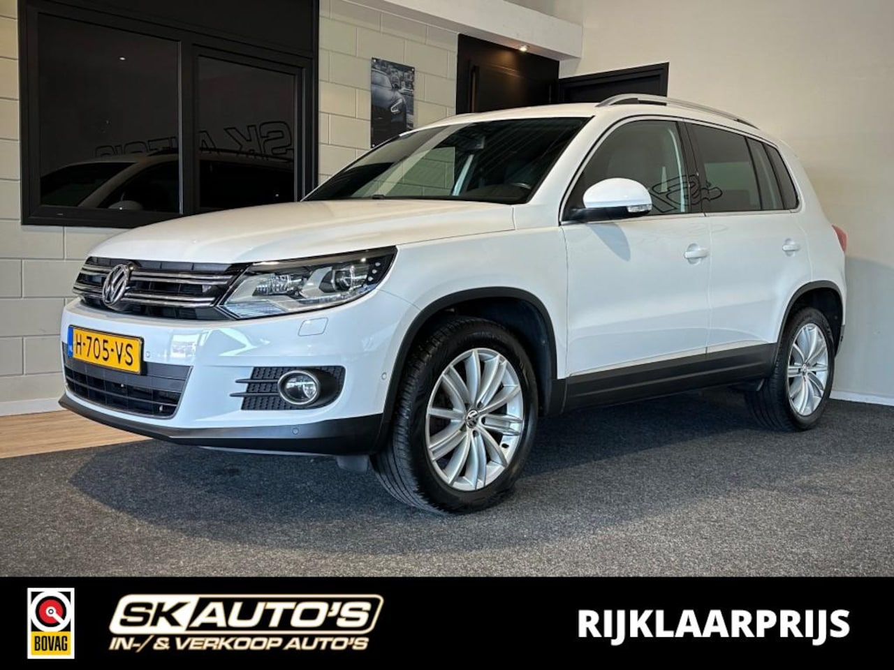 Volkswagen Tiguan - 1.4 TSI R-LINE ED. l STOELVERW l NAVI l PDC l CLIMA l AUTOMAAT! l - AutoWereld.nl