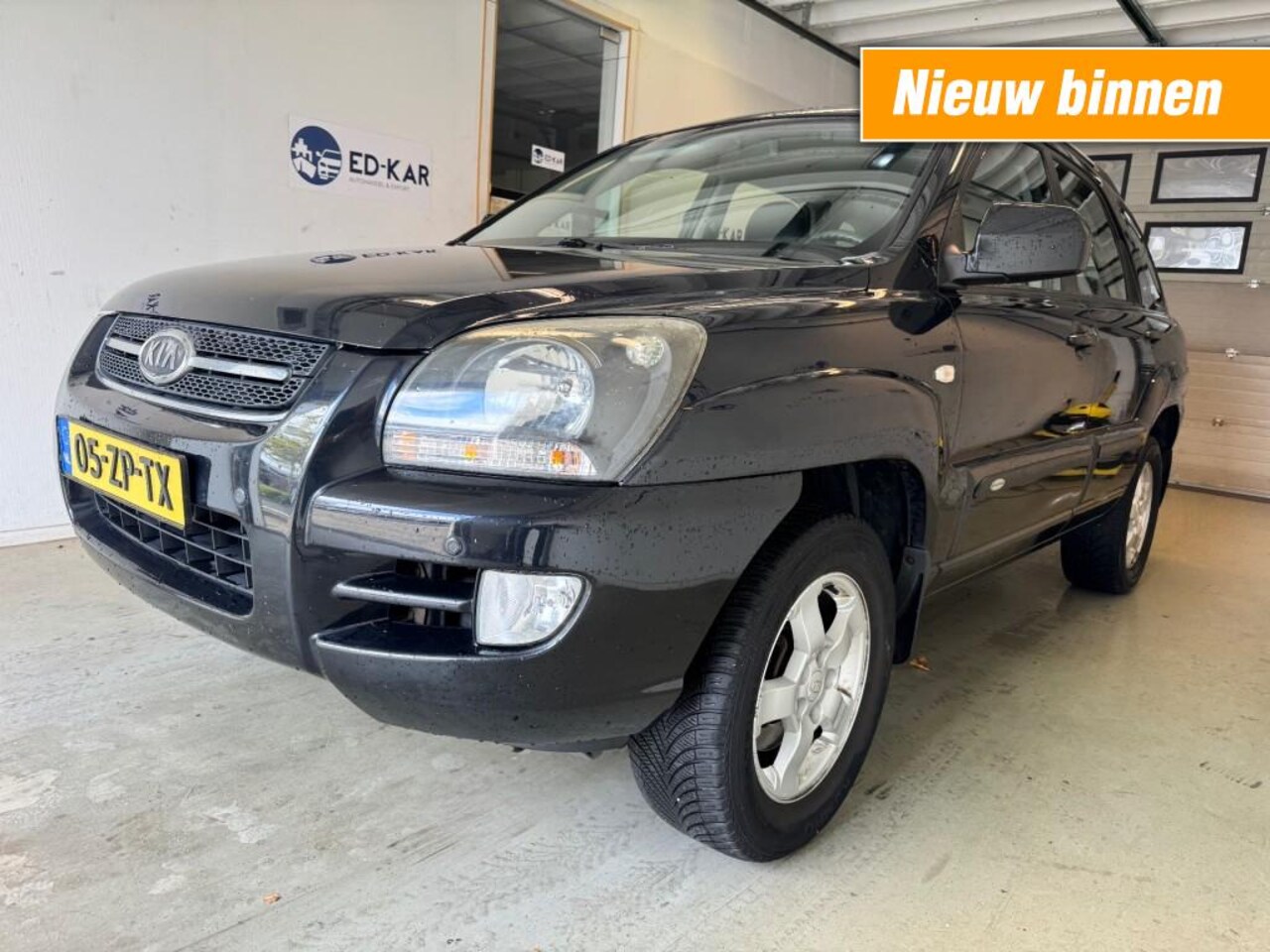 Kia Sportage - 2.0 CVVT X-ecutive CLIMA TREKHAAK PDC RIJDT GOED NAP APK 3-2026 - AutoWereld.nl