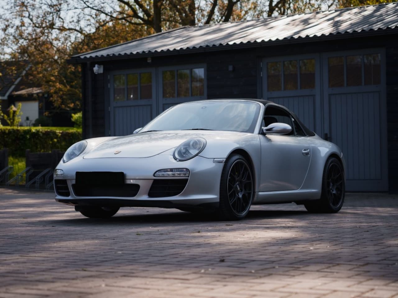 Porsche 911 Cabrio - Carrera 3.6L Cabrio - Artic Silver Metallic - 6 speed Manual - AutoWereld.nl