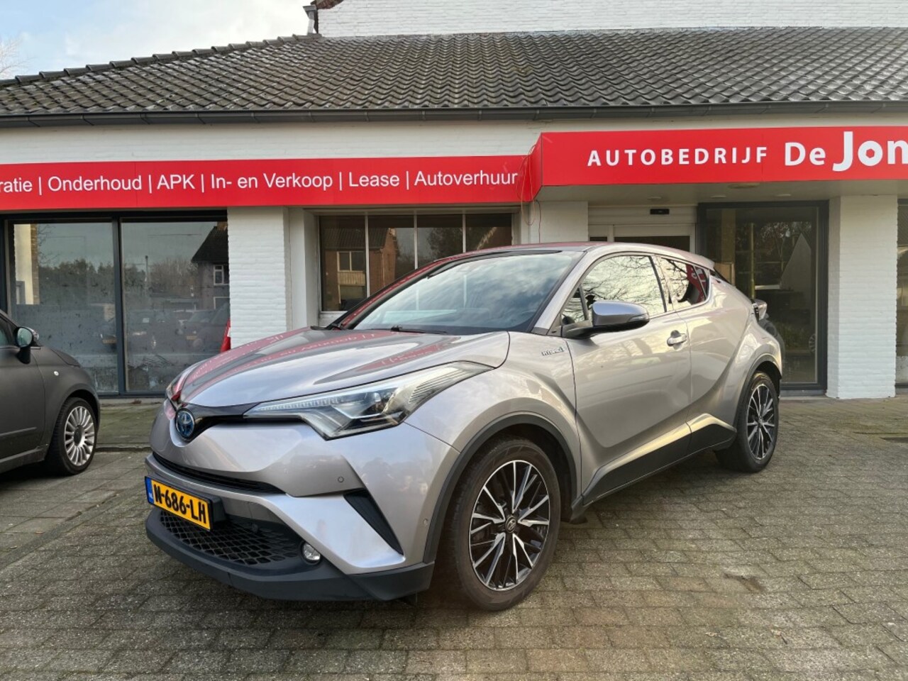 Toyota C-HR - 1.8 HYBRID EXECUTIVE / NAVI / CAMERA / DAB / STOELVERW. / LED / 18'' LMV - AutoWereld.nl