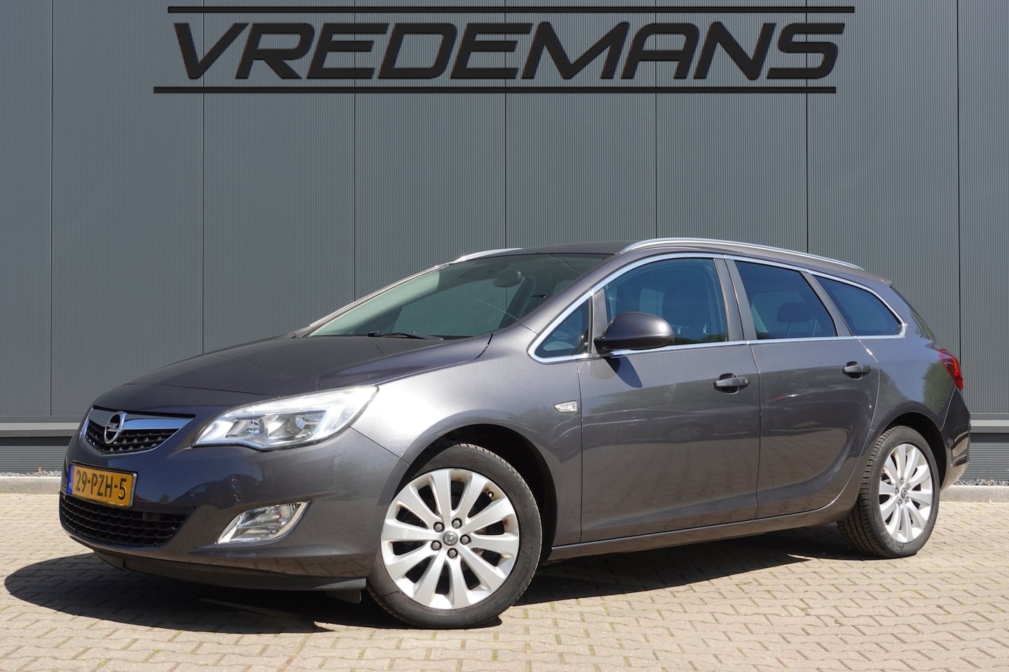 Opel Astra Sports Tourer - 1.4 Cosmo 1.4 Cosmo - AutoWereld.nl