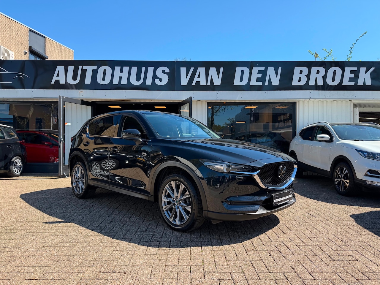 Mazda CX-5 - 2.5 4WD SkyActiv-G|194Pk|Hud|Xenon|Memory|Navi|Adaptive Cruise|Carplay|Leer|Lmv|Nw Apk - AutoWereld.nl