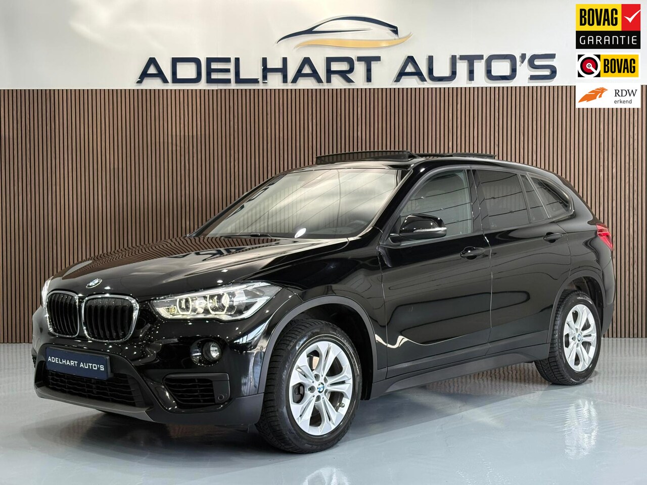 BMW X1 - SDrive18i Executive Sportline Automaat / Panorama dak / Navigatie full map / Camera / Crui - AutoWereld.nl