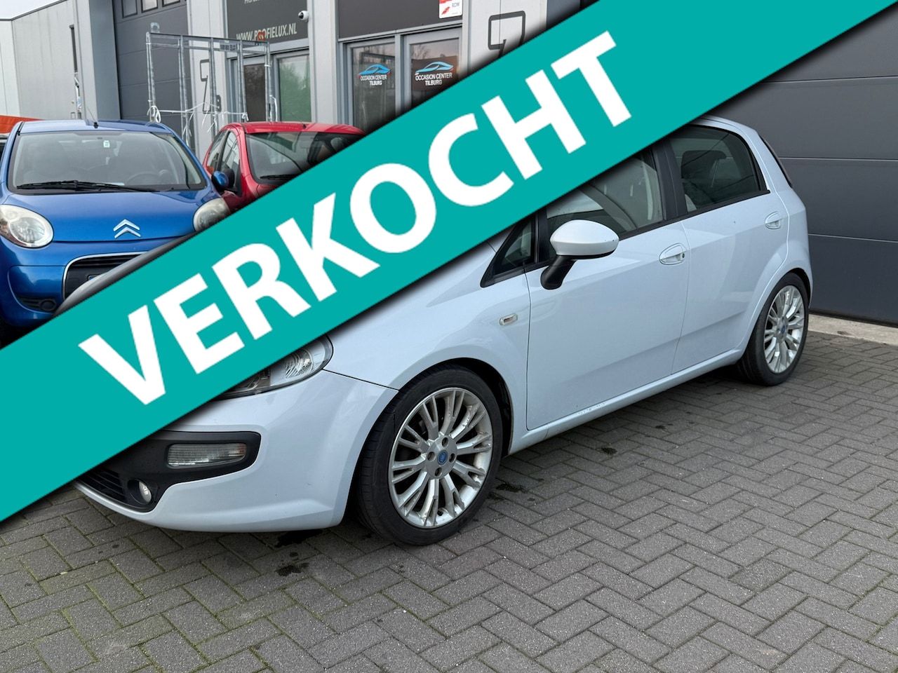 Fiat Punto Evo - 1.4 AIRCO | ELEKTR PAKKET | NAVI | NIEUWE APK | - AutoWereld.nl